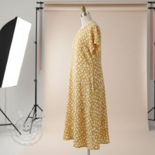 Double gauze/musselin JACQUARD Dots dark yellow