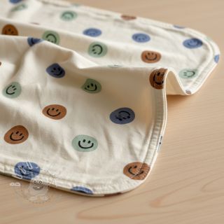 Baumwollstoff FLANNEL Happy faces off white green